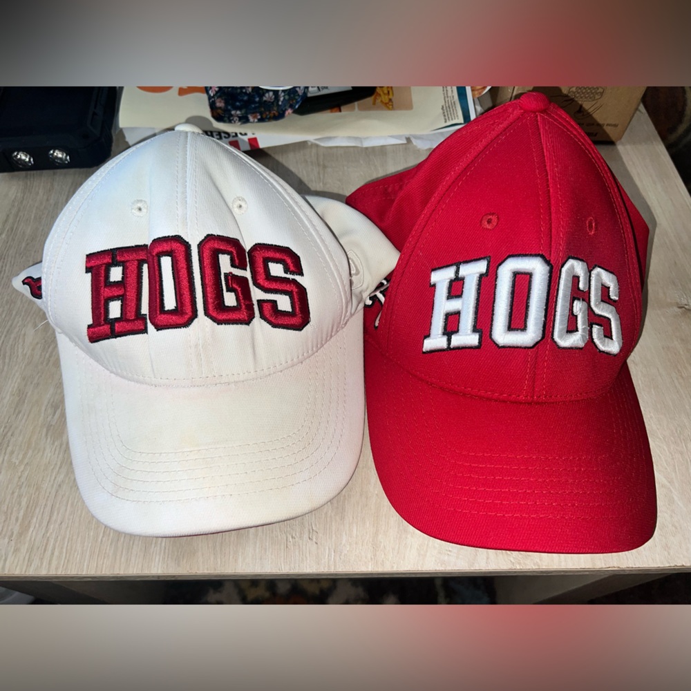 Red and White Arkansas Razorback HOGS Caps. Good condition, white slightly dirty